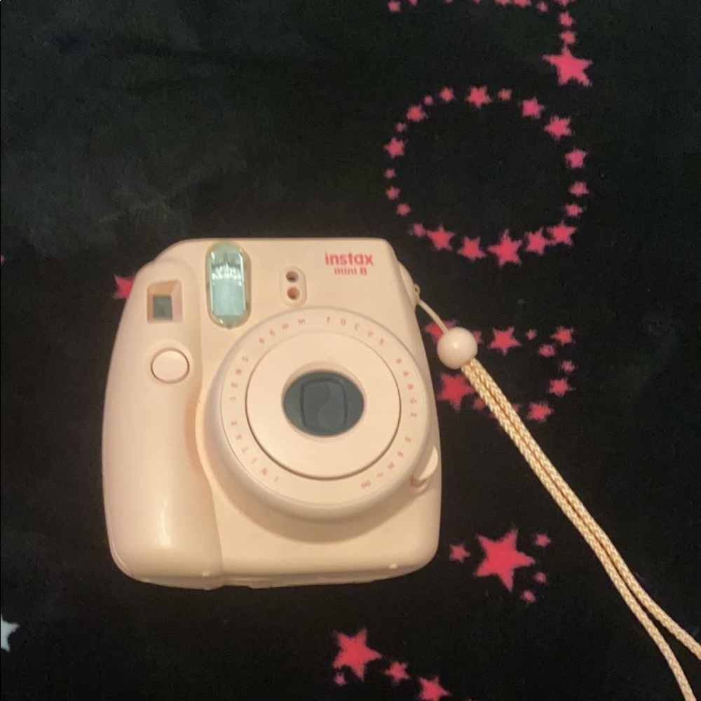 Pink polaroid camera